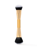 tarte Makeup brush with black bristles on a white background