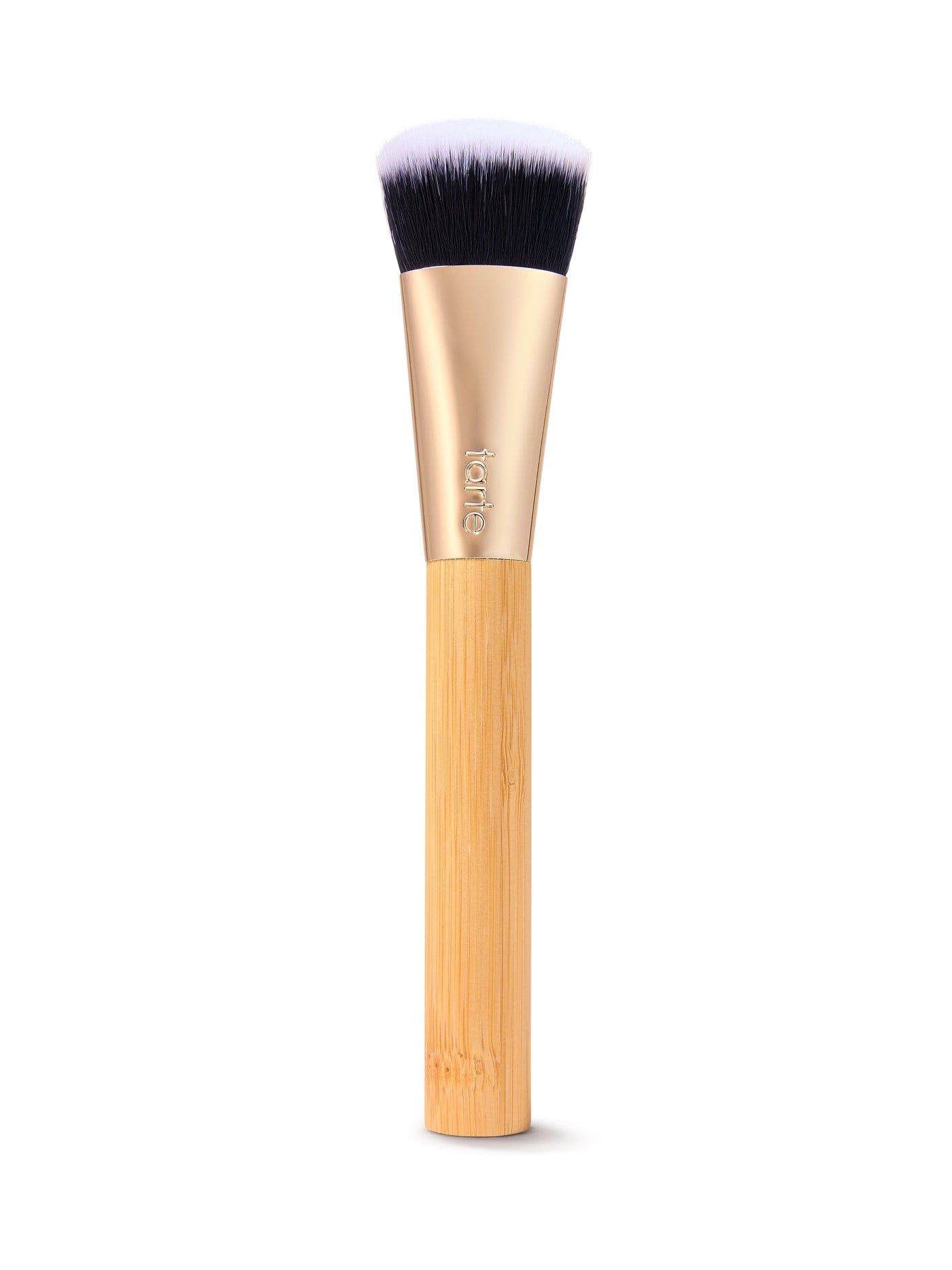 Makeup brush with wooden handle and black bristles on a white background