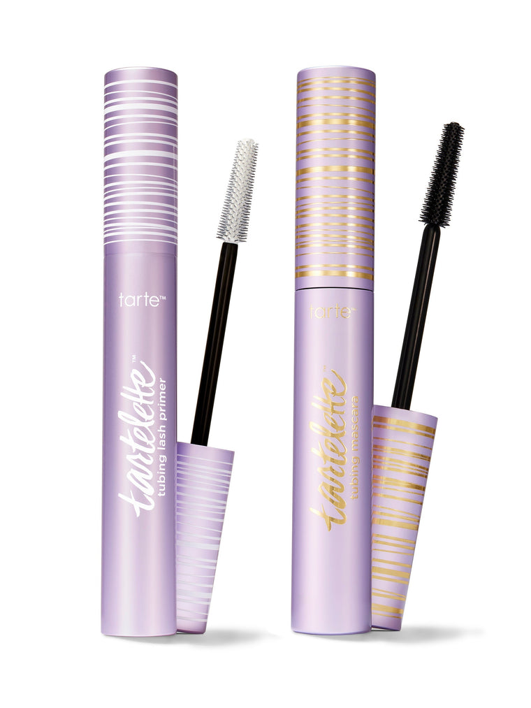 Tarte La Fille Mascara and Lash Primer with applicators on a white background
