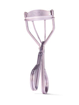 Lash curler with 'tarte' branding on a white background