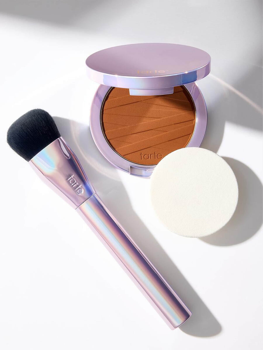 shape tape™ pressed powder brush coverage result