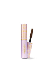 Eyebrow mascara with a purple and gold packaging on a white background