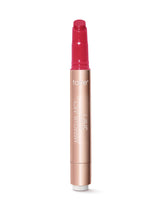 Lip tint with pink cap and rose gold body on a white background