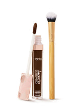 tarte creaseless creamy concealer with applicator and brush on a white background