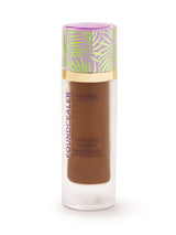 Tarte foundation bottle with colorful cap on a white background